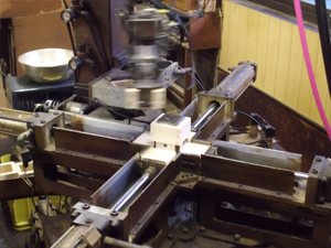 The frame of the masu cups is assembled using this peculiar machine